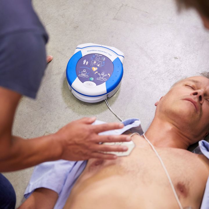 Heartsine Sam 500p Connected Action Image On Ground 1